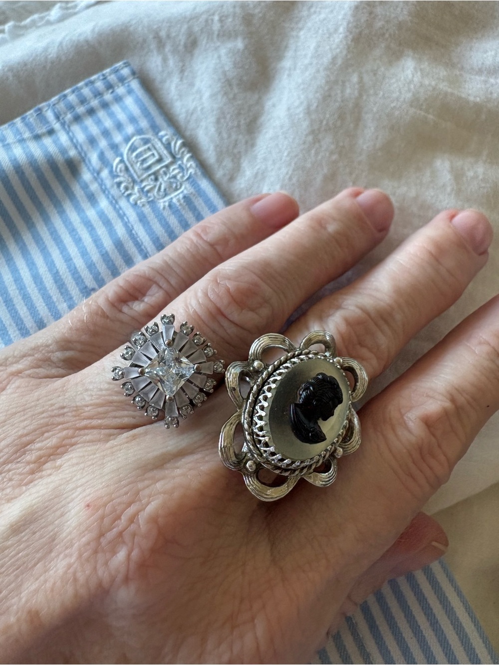 Set of two rings made from vintage clip earrings. Size adjustable.